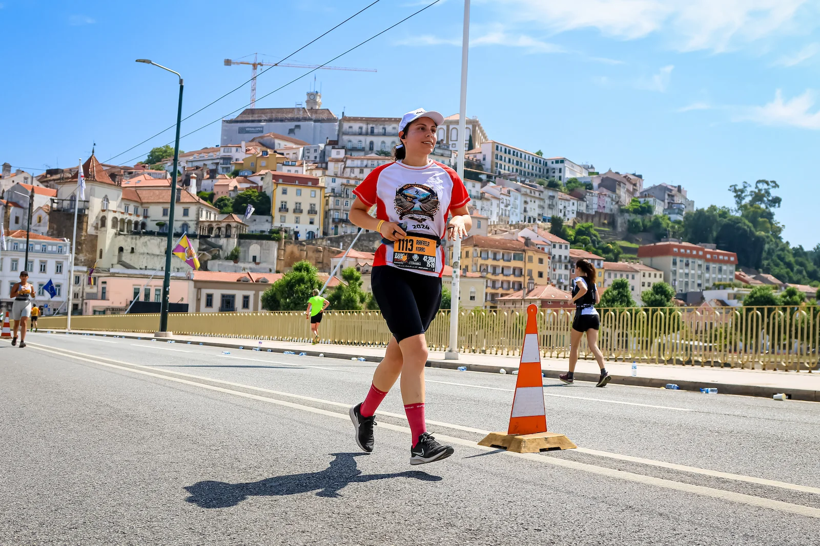 Running with Coimbra in the background